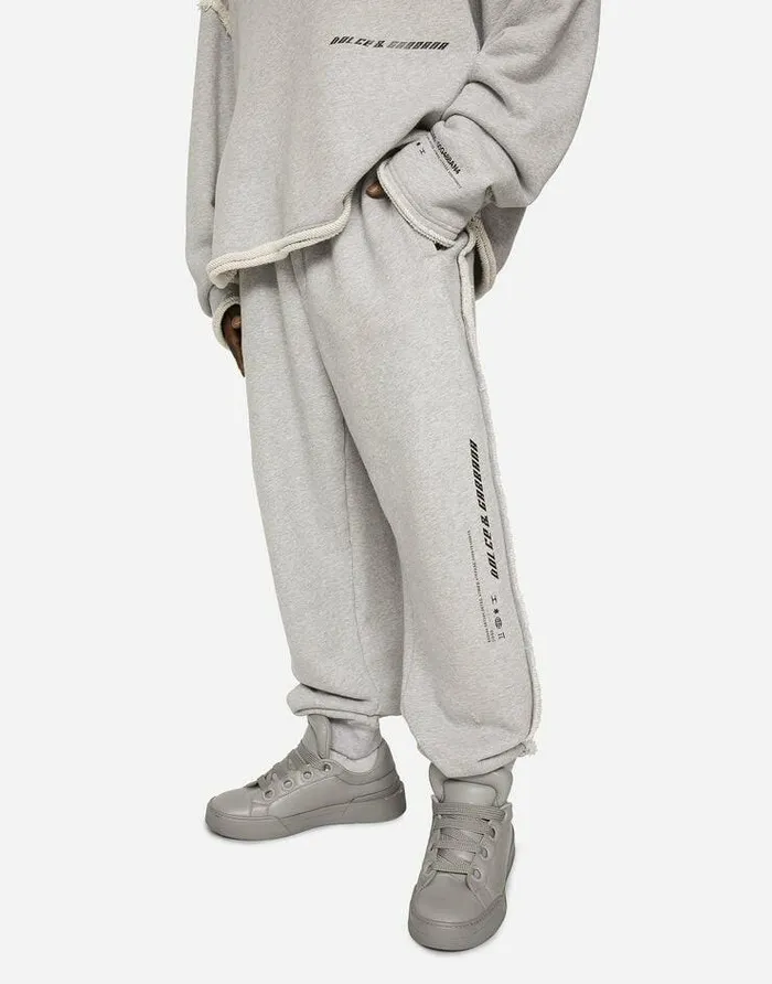Dolce and Gabbana Trousers And Shorts Men Printed Jogging Pants With Small Abrasions Grey Dolce and Gabbana Trousers And Shorts Men Printed Jogging Pants With Small Abrasions Grey