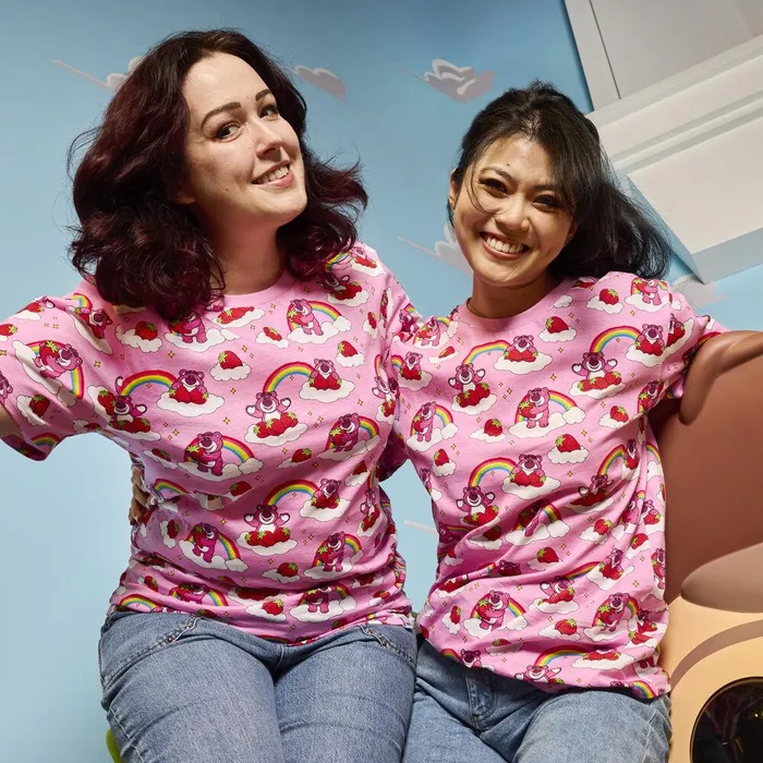 Loungefly Apparel Unisex Toy Story Lotso Rainbow AllOver Print Tee Loungefly Apparel Unisex Toy Story Lotso Rainbow AllOver Print Tee